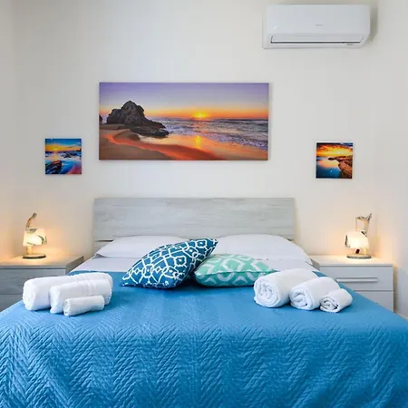 Cala Azzurra And Holidays House Couette-café