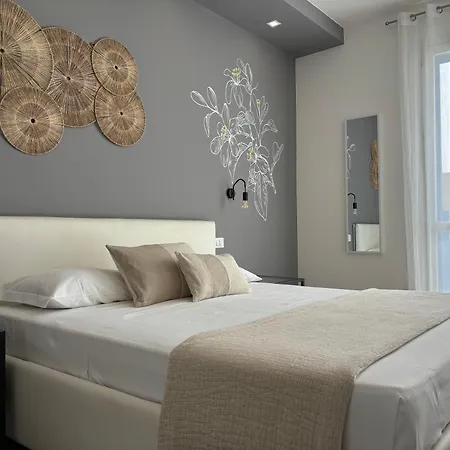 Couette-café Cala Azzurra And Holidays House *